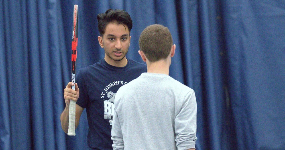 Ghai and Vaitzman Take Top Two Singles Matches in Men’s Tennis Duel With SJC Long Island